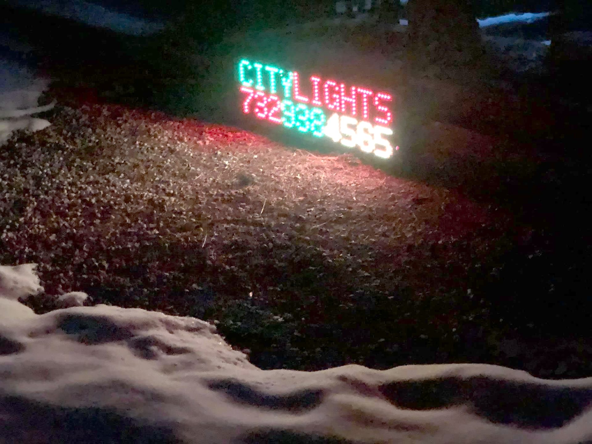 City Lights Recording Studio LED sign on Route 33 in Farmingdale, NJ, lit at night